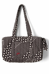 Damson Madder quilted weekender bag - washed black spot stripe print