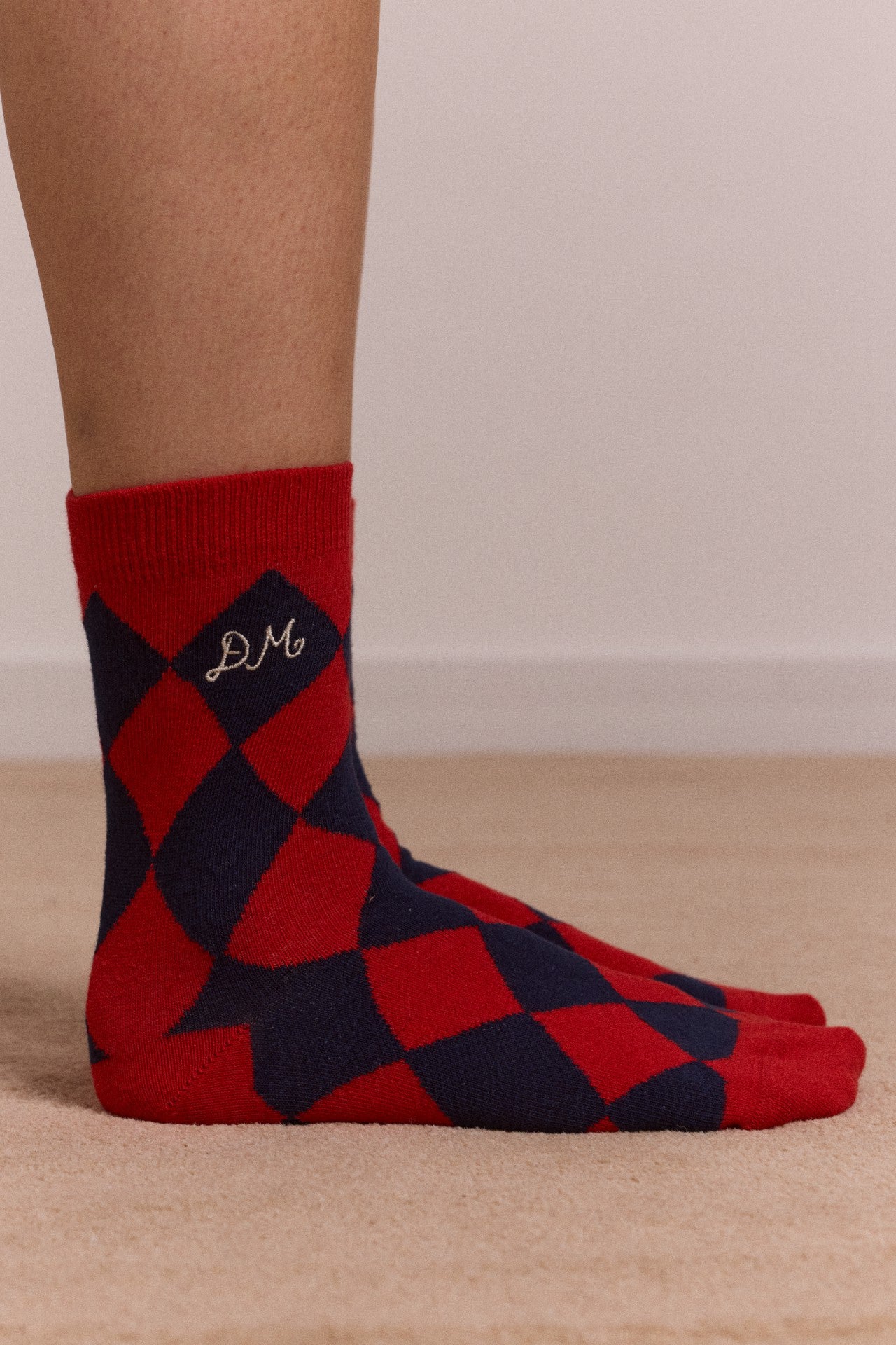 Damson Madder calf length socks - navy & red harlequin