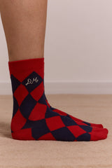 Damson Madder calf length socks - navy & red harlequin