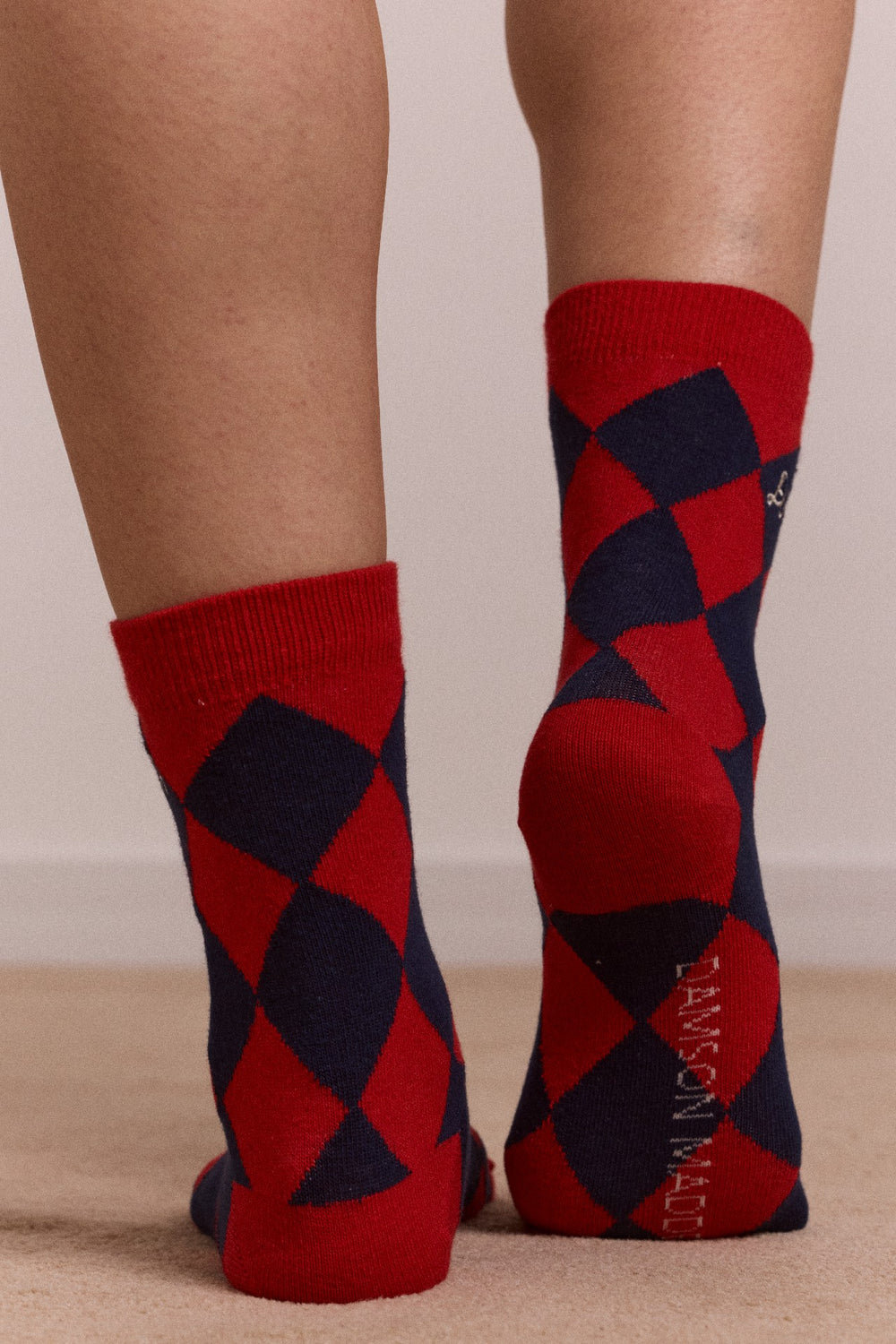 Damson Madder calf length socks - navy & red harlequin