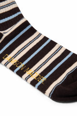 Damson Madder calf length socks in brown stripe