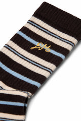 Damson Madder calf length socks in brown stripe