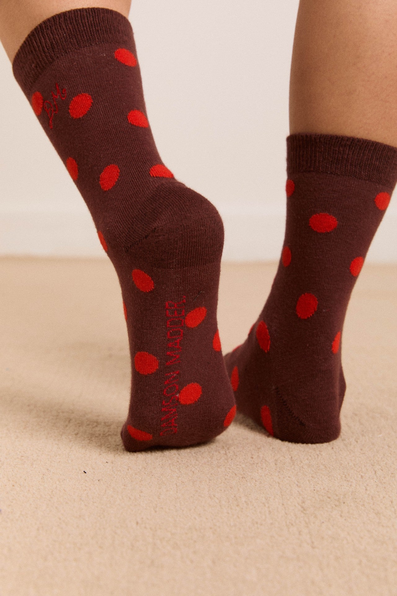 Damson Madder calf length socks in burg & red polka dot