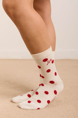 Damson Madder calf length socks in white & red polka dot