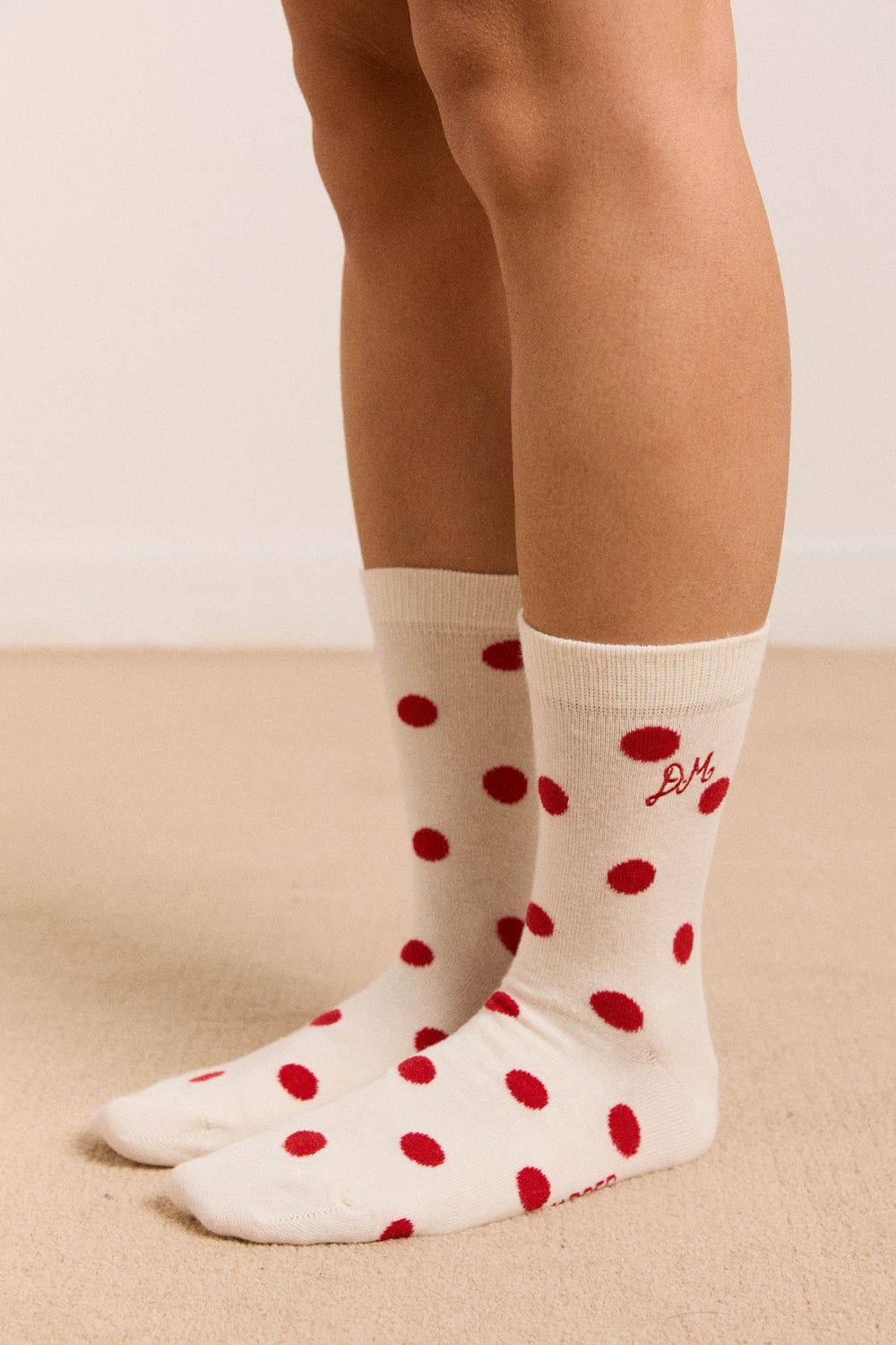 Damson Madder calf length socks in white & red polka dot