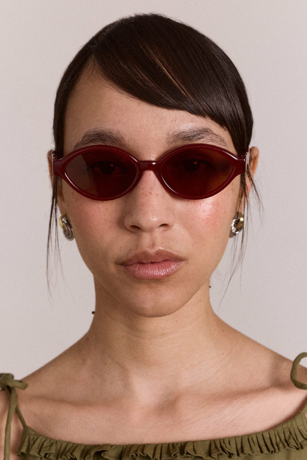 Damson Madder wavey temple sunglasses - crystal red