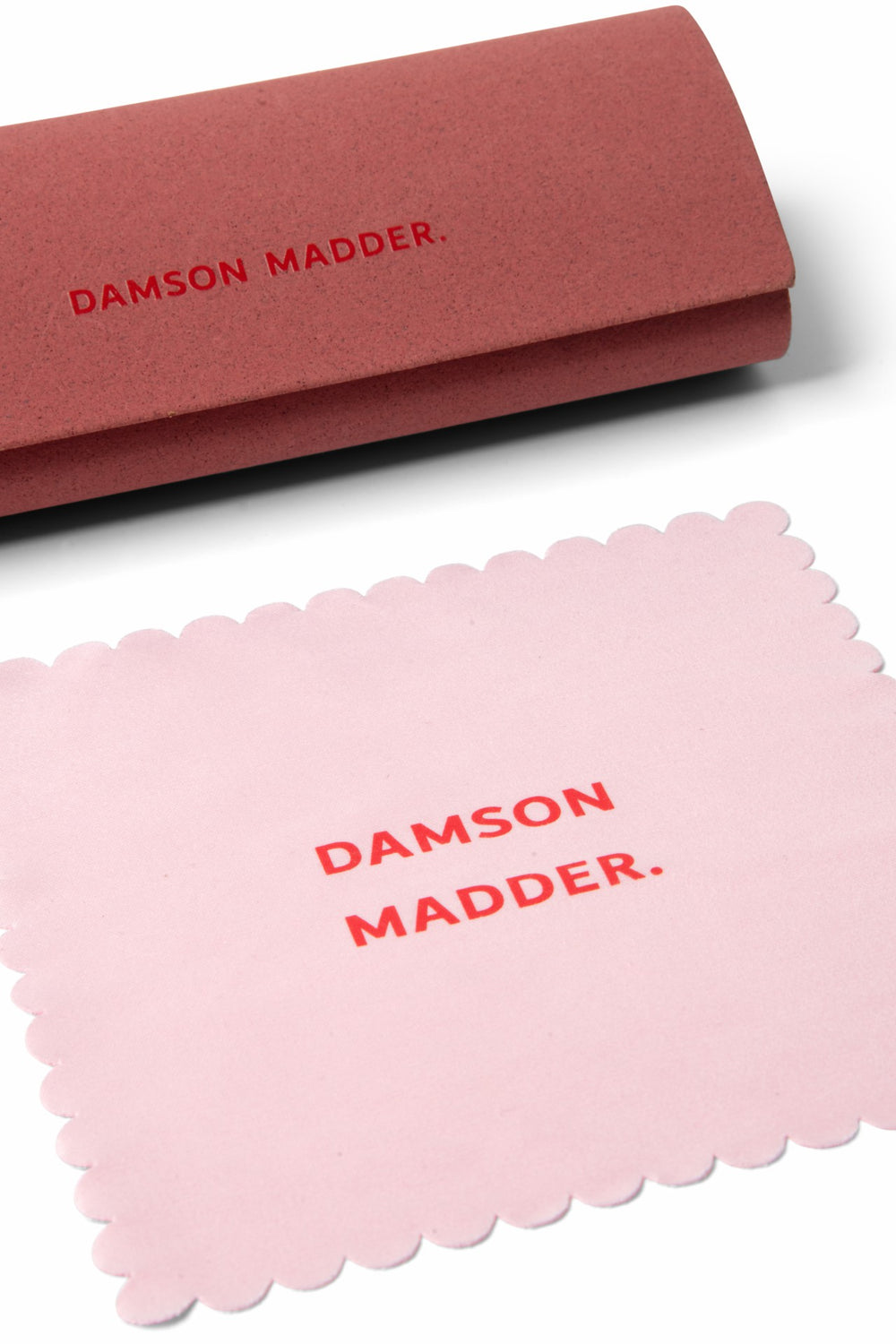Damson Madder wavey temple sunglasses - crystal red